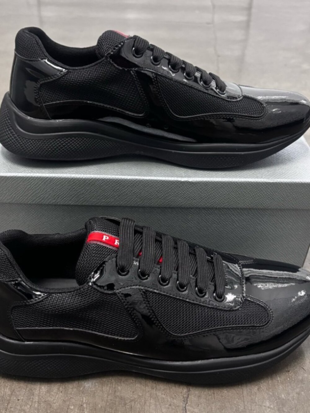 Prada patent leather black low top sneakers with red tongue tab - Picture 2 of 4